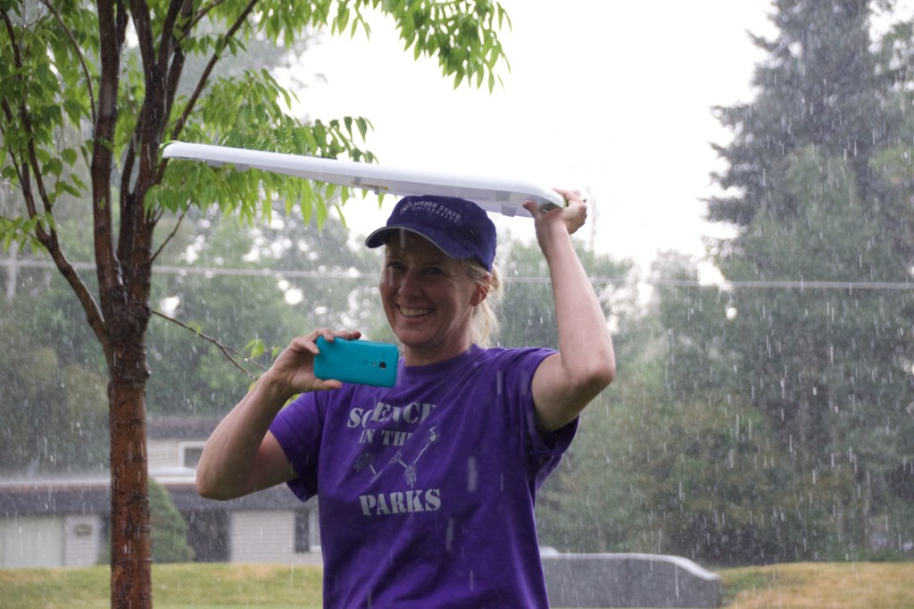 Intrepid Misti bravely ventures into the rain, but takes cover